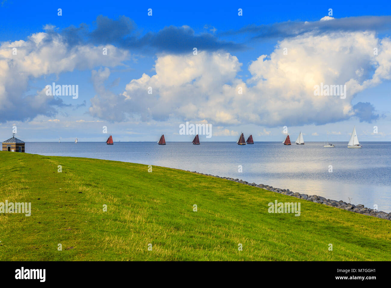 Skegrace with traditional friesian sailing ships named skutsjes on the IJsselmeer at Hindeloopen Stock Photo