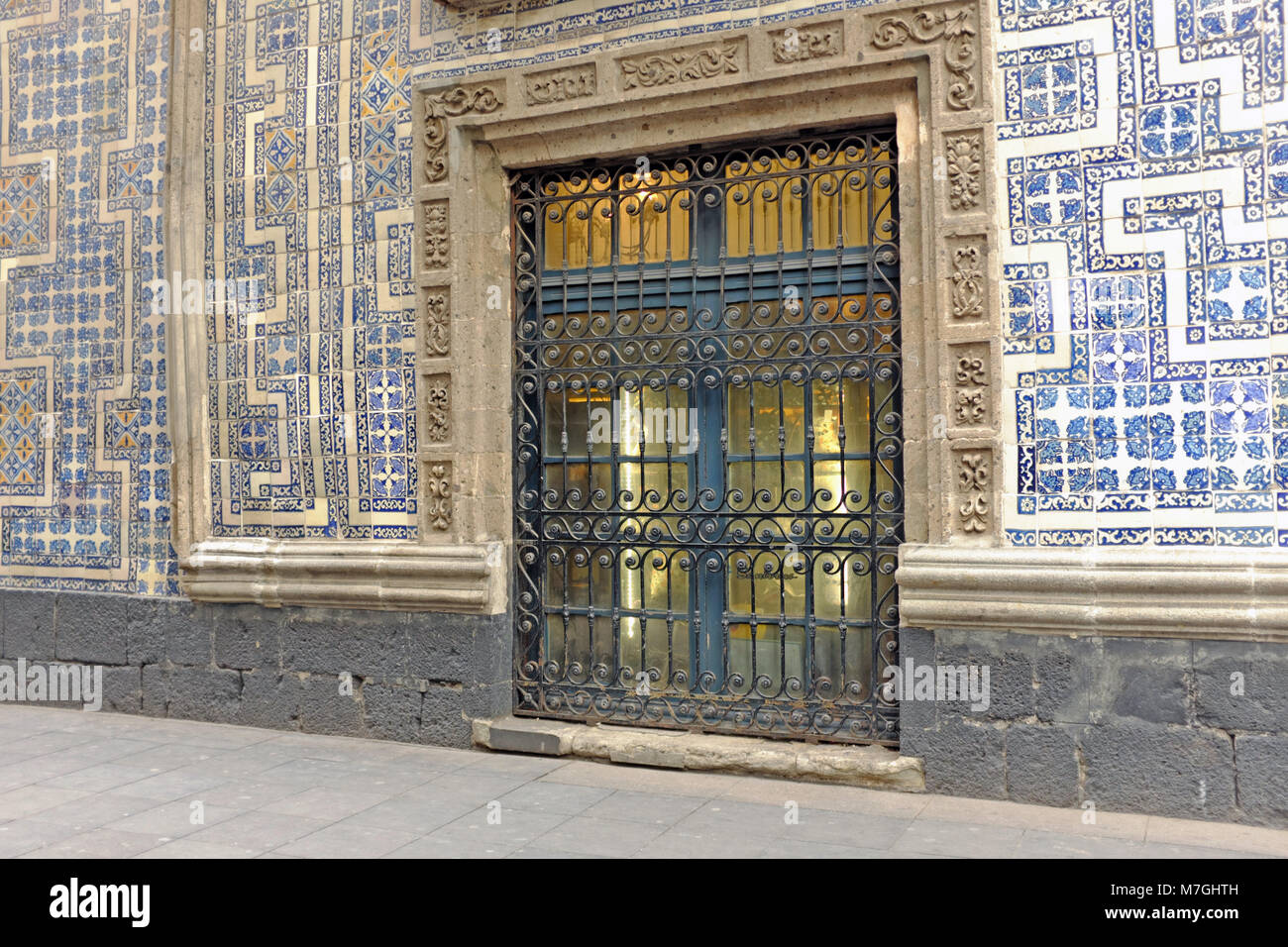 Exterior of the House of Tiles building which is covered in blue and white Puebla tiles and located in the historic centro of Mexico City, Mexico. Stock Photo