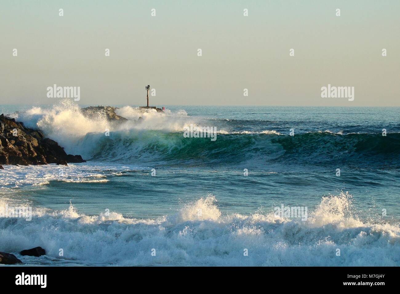 Waves crashing at The Wedge in Newport Beach California Stock Photo