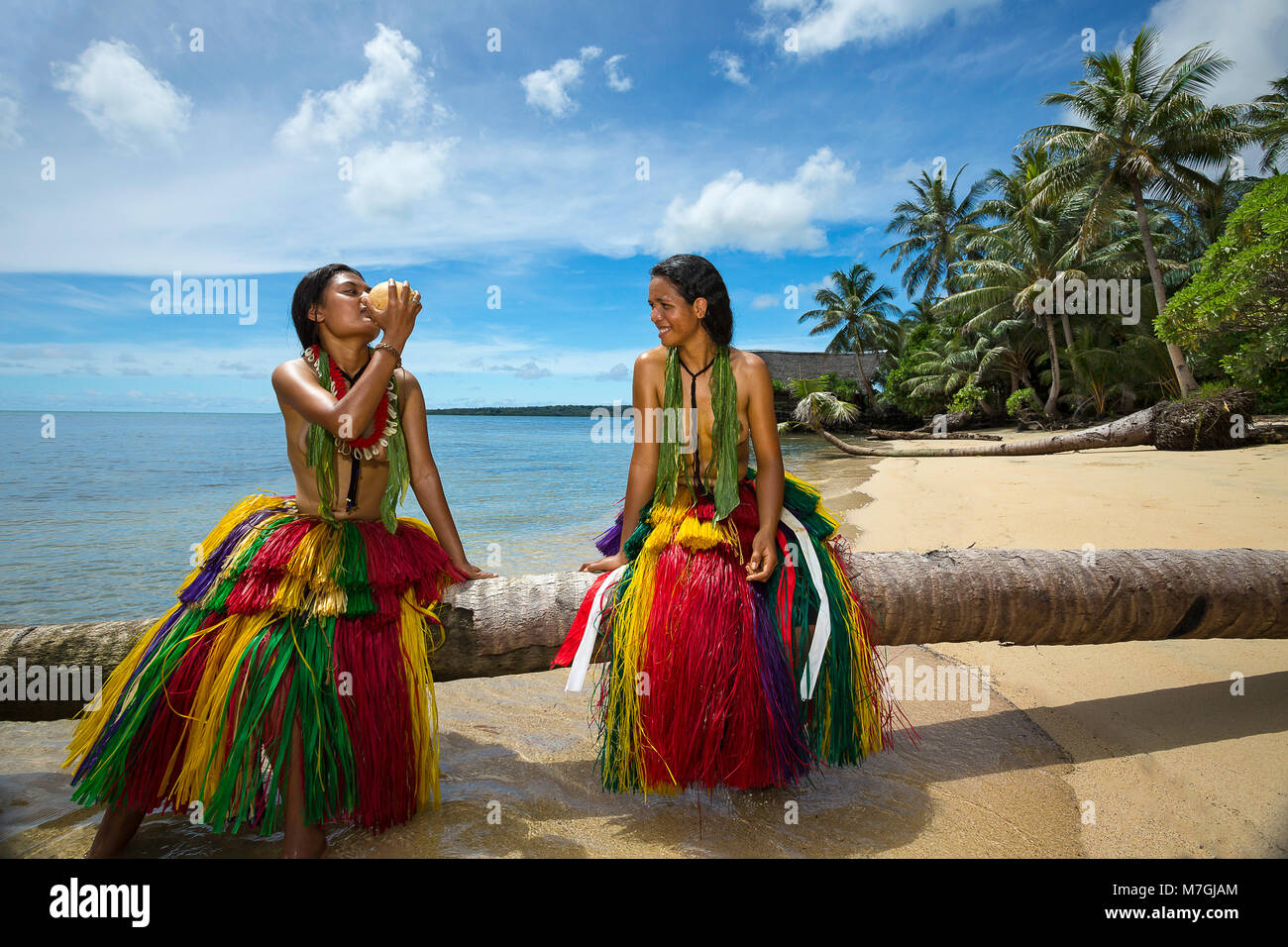 These two young girls (MR) are in traditional outfits for cultural cerimonies on the island of Yap, Micronesia. Stock Photo
