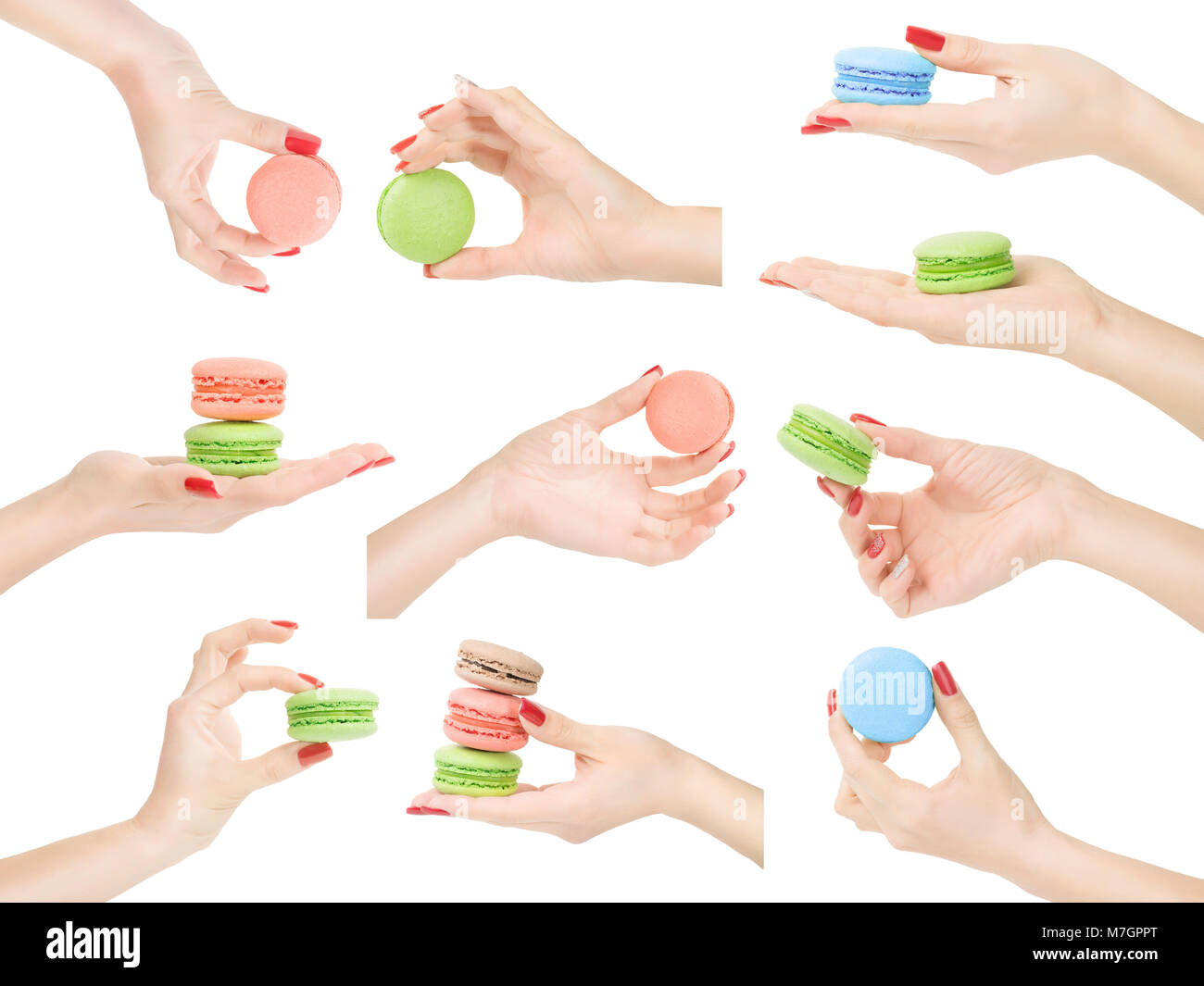 Woman hands with beautiful skin and nail polish holding, showing or measuring macaroons set. Isolated on white, clipping path included Stock Photo