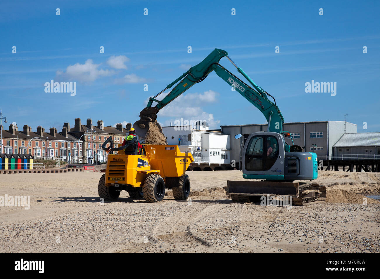 Hydraulic excavator on a beach hi-res stock photography and images - Alamy