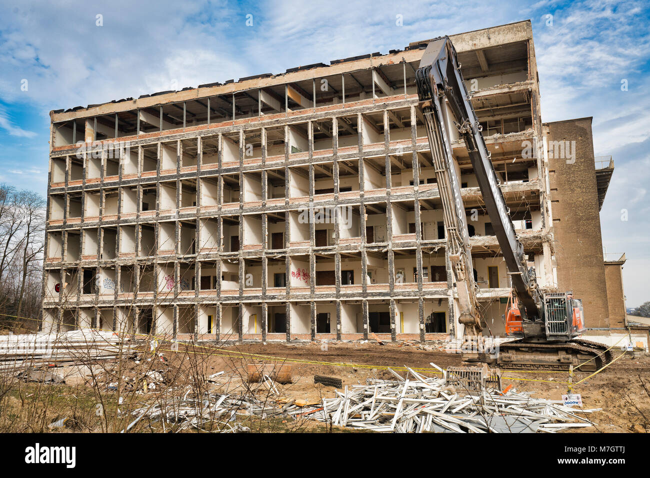 Old hospital building being demolished Stock Photo