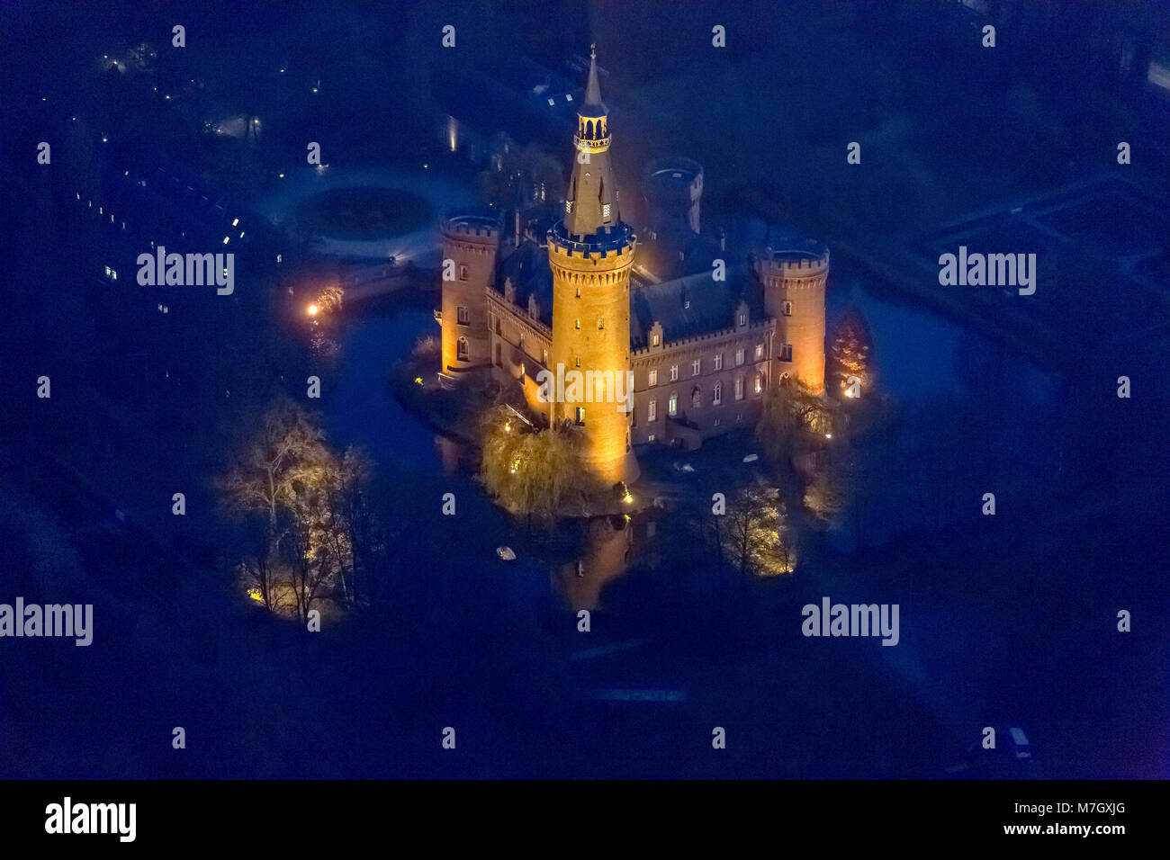 Aerial view, Bedburg-Hau, Lower Rhine, neo-gothic castle, historicizing Tudor style, moated castle, Moyland Castle, North Rhine-Westphalia, Germany, E Stock Photo