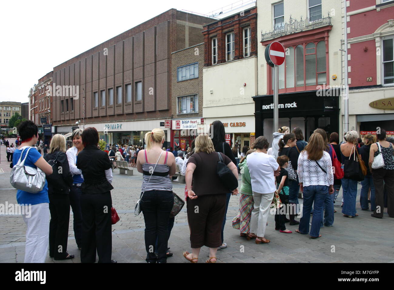 The sales, with female customers queuing outside Primark, Derby, UK Stock Photo