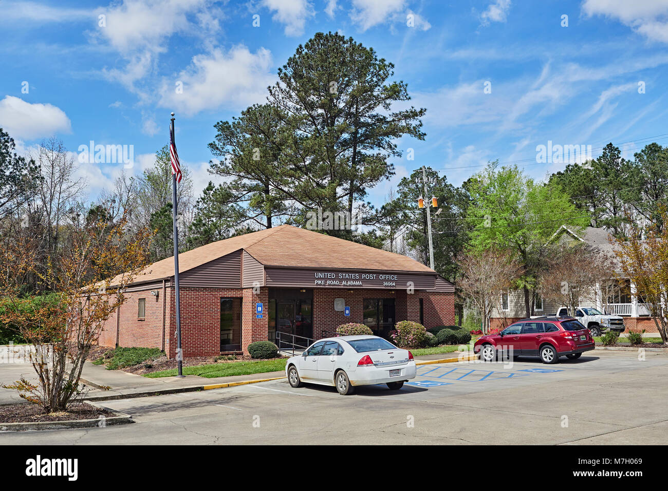 Exterior front entrance to the small rural town Post Office in Pike Road, Alabama, USA. Stock Photo