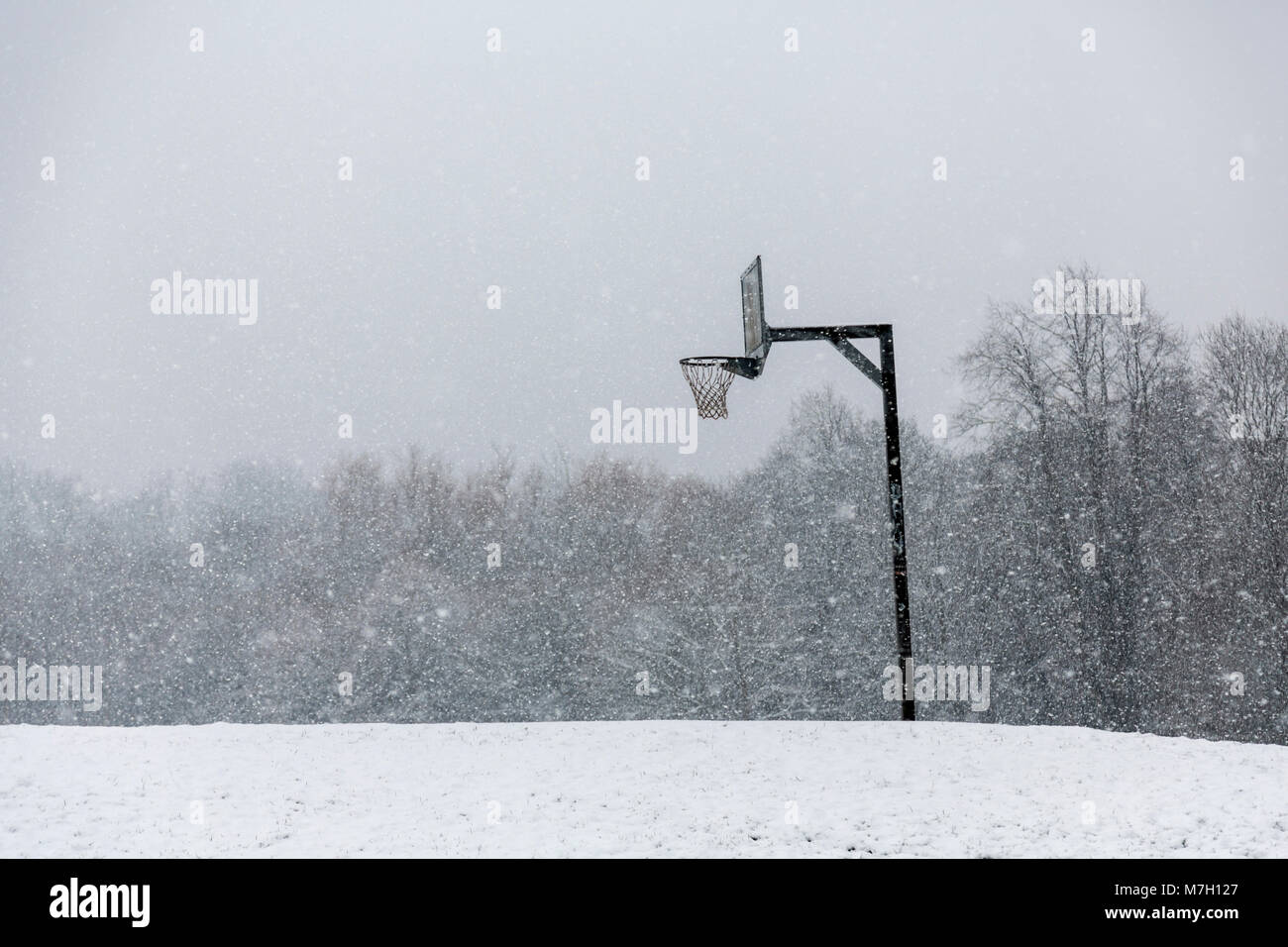Basketball court in the snow Stock Photo