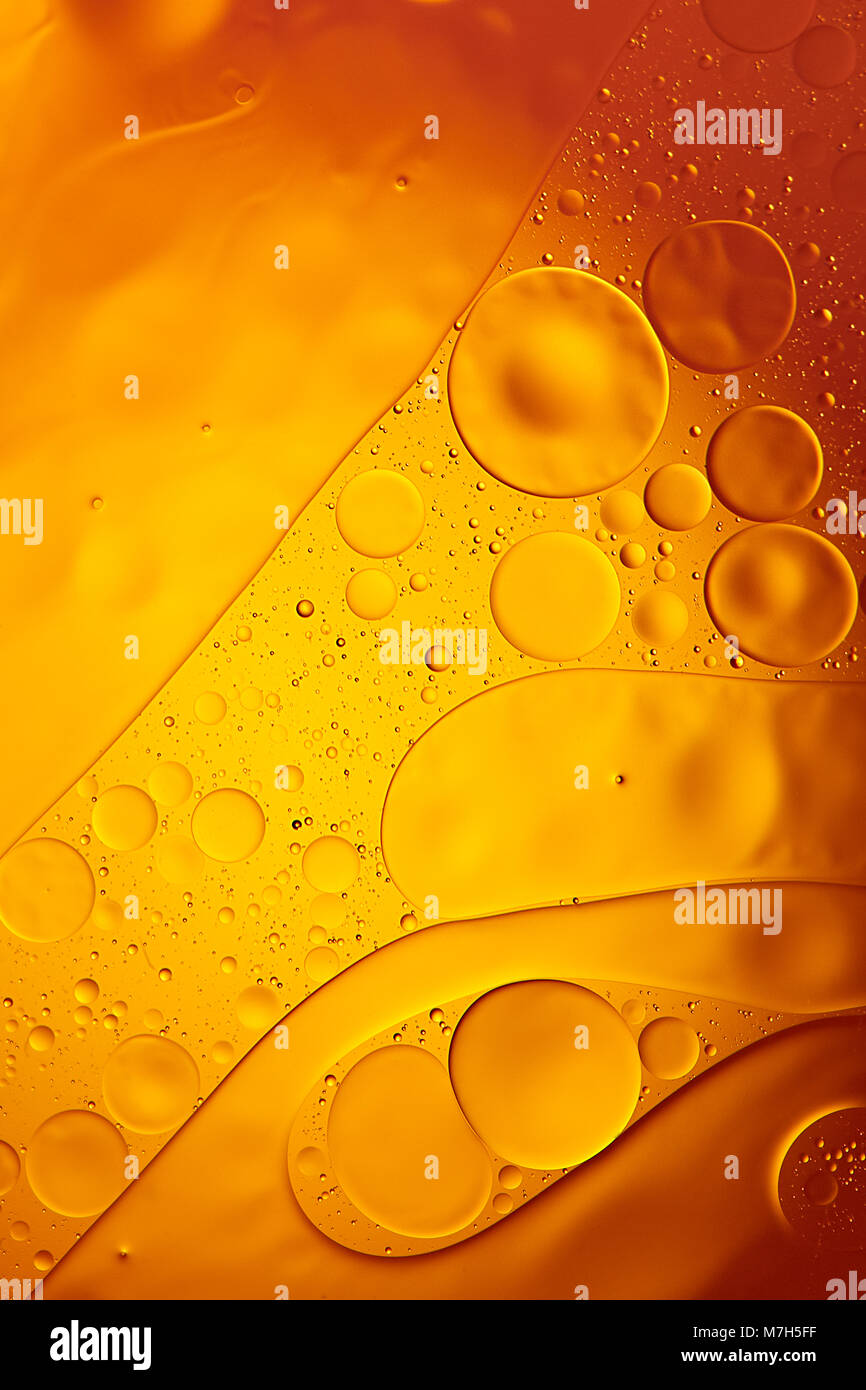 Mixing water and oil, beautiful color abstract background based on red and  yellow circles and ovals, macro abstraction, selective focus. Abstract colo  Stock Photo - Alamy