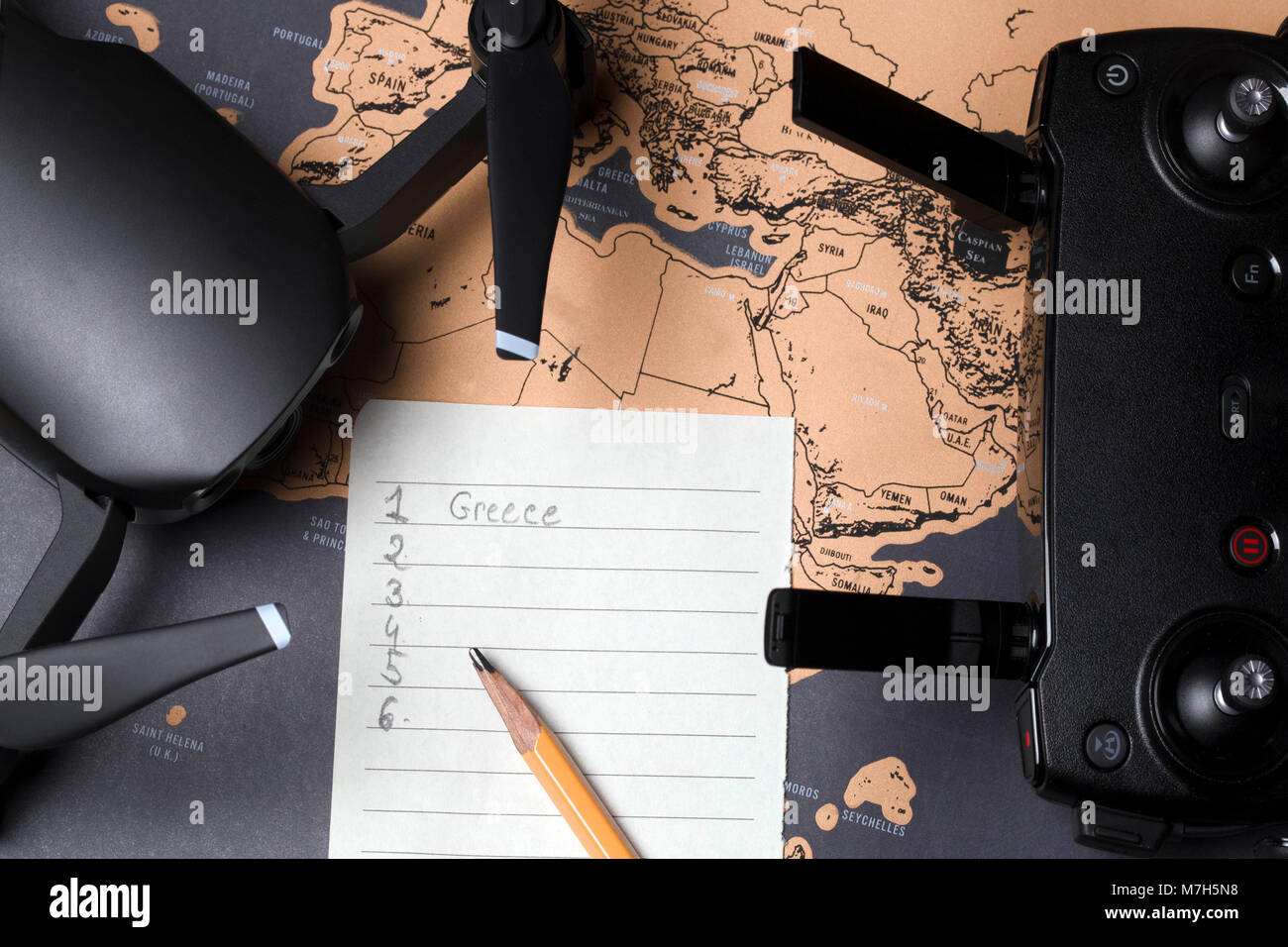 drone dji mavic air and control panel, on a map near the leaf for text,  concept for travel aerial filming Stock Photo - Alamy