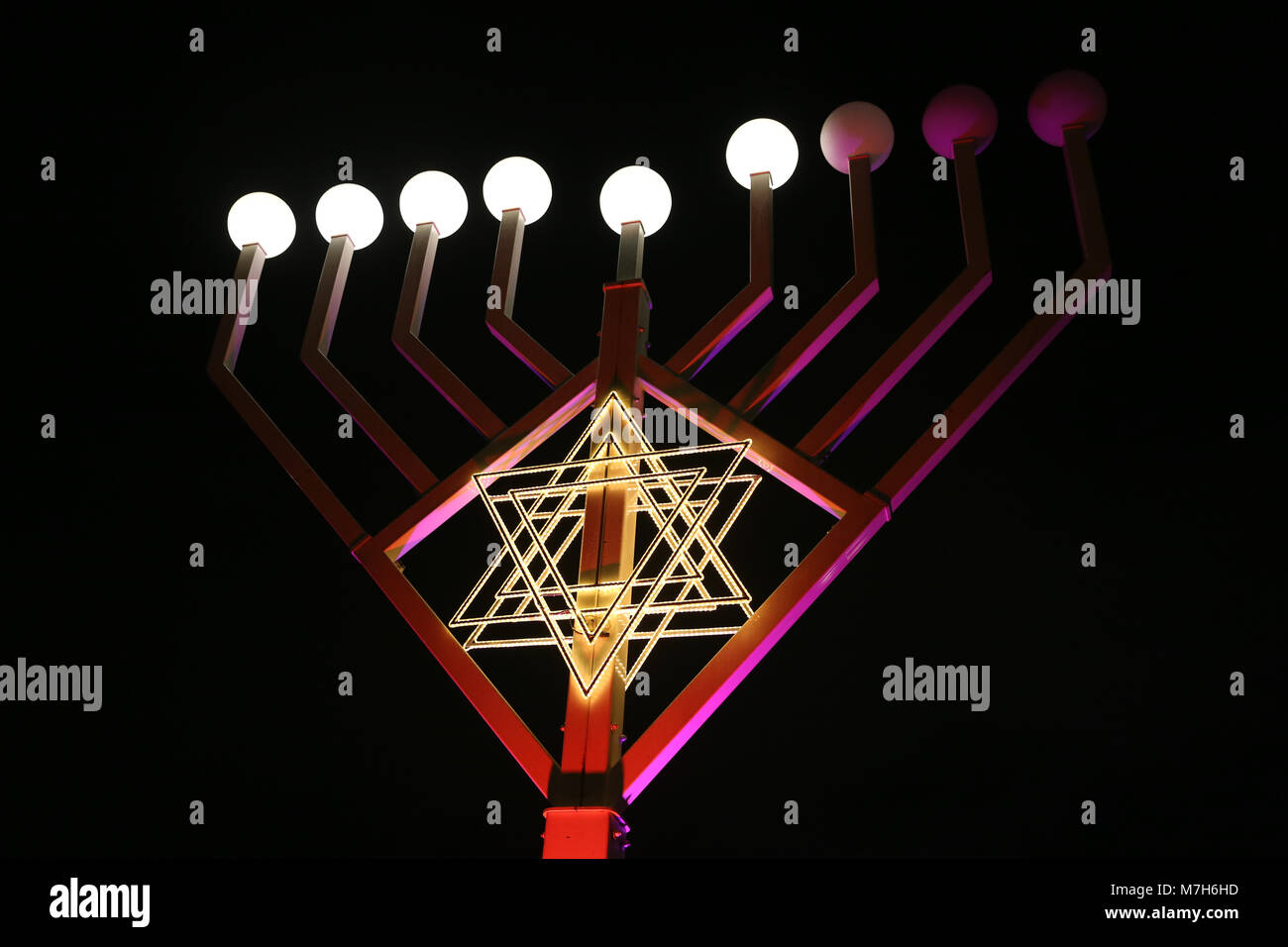 A Hanukkiah, A Menorah with nine branches Stock Photo