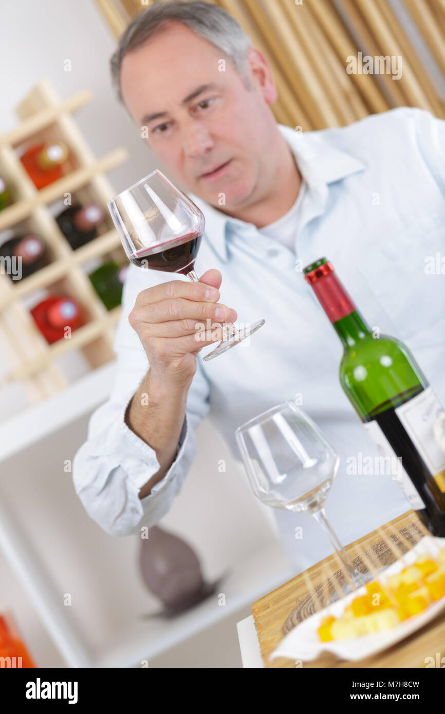 man tasting red wine Stock Photo - Alamy