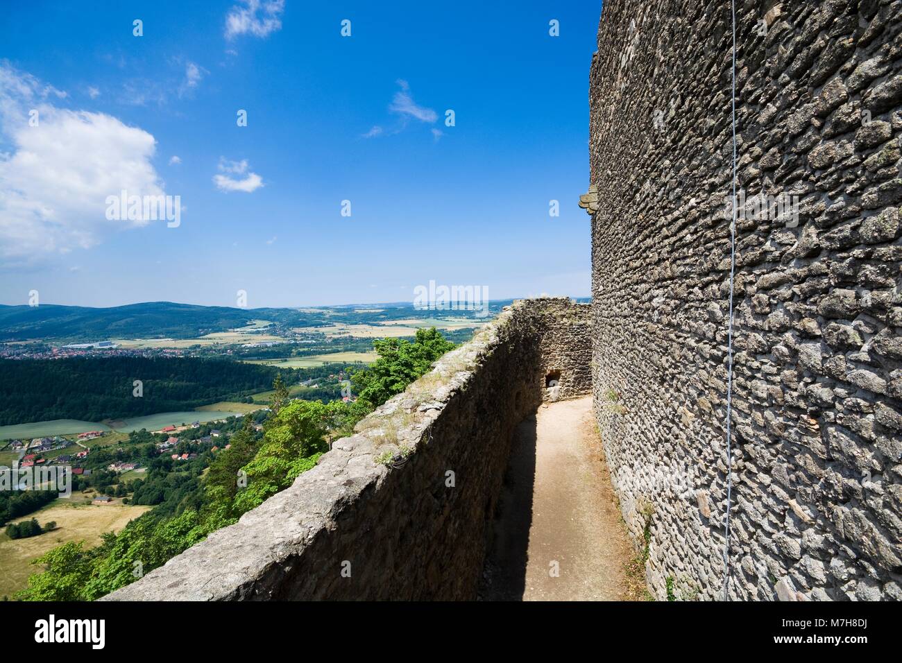 View of ruins of medieval Chojnik castle situated on the top of high hill covered with forest in Jelenia Gora, Poland Stock Photo