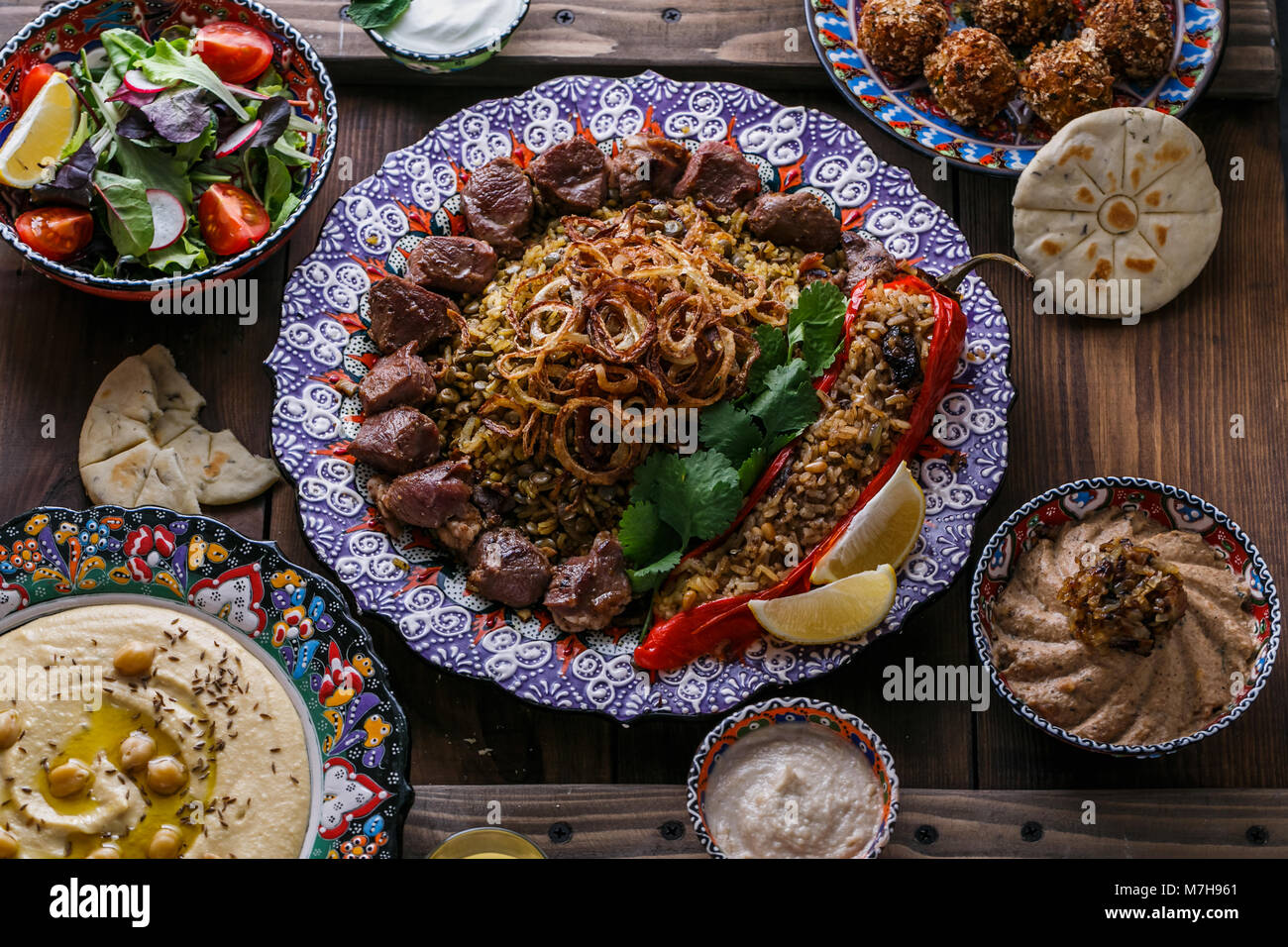 Middle eastern or arabic dishes shish kebab, falafel, hummus, rice