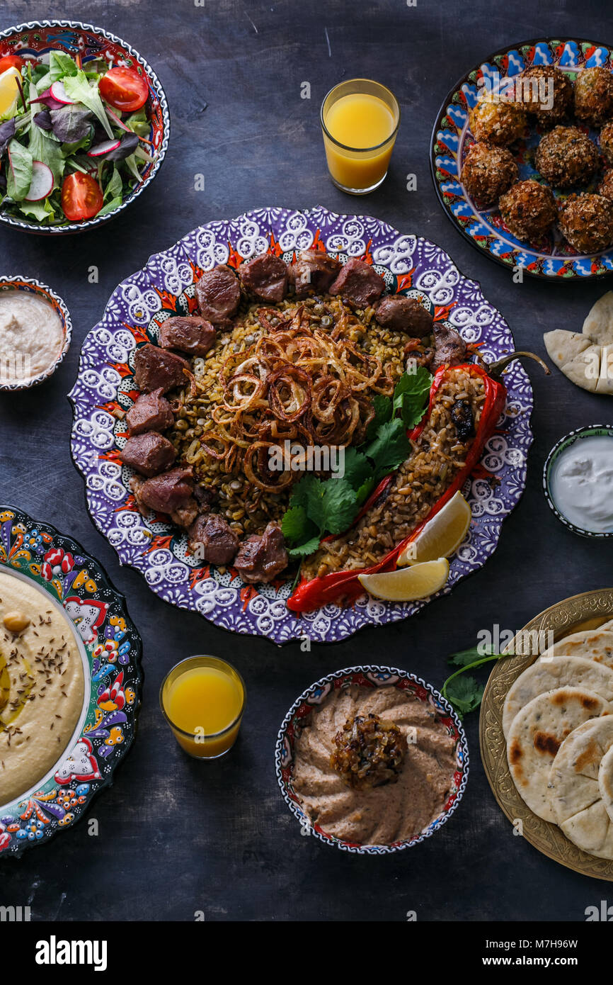 Middle eastern or arabic dishes shish kebab, falafel, hummus, rice