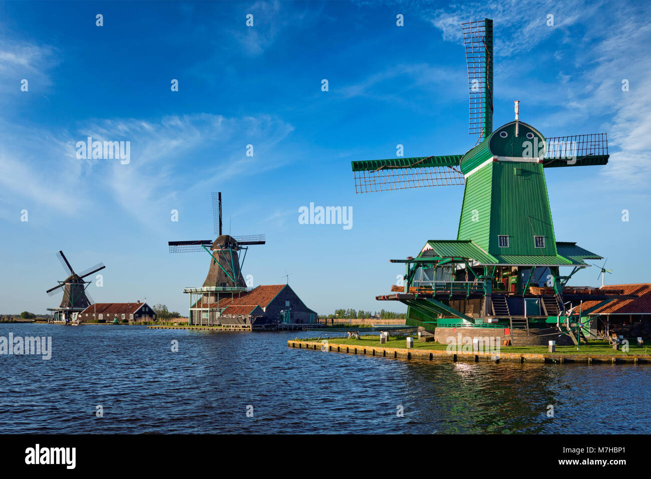 Windmills at Zaanse Schans in Holland on sunset. Zaandam, Nether Stock Photo