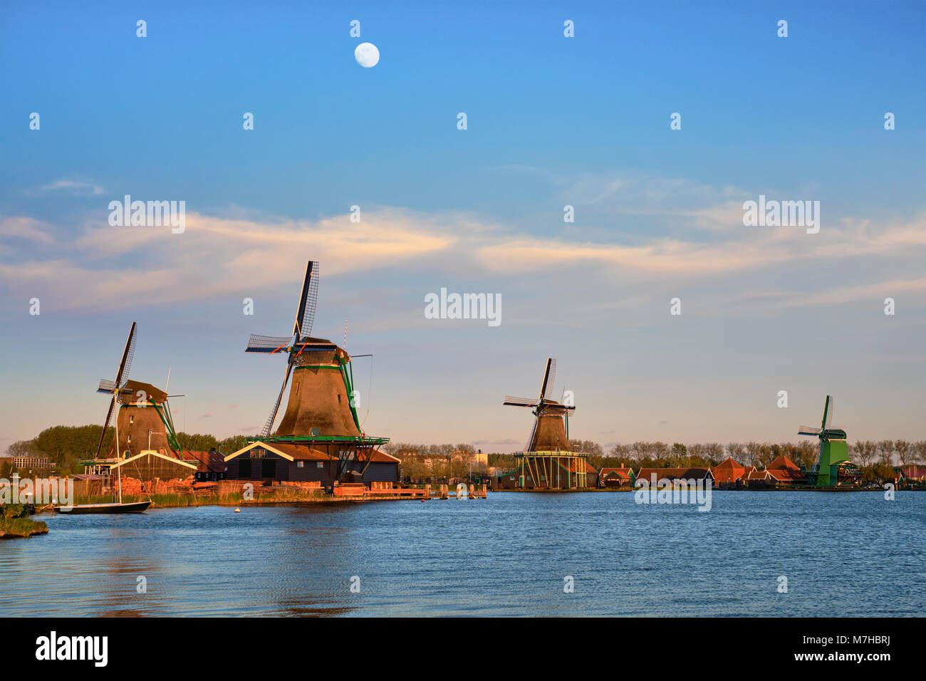 Windmills at Zaanse Schans in Holland in twilight on sunset. Zaa Stock Photo