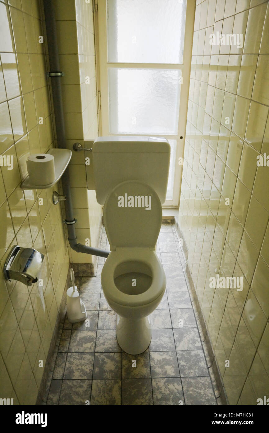 Narrow public toilet cubicle, Marienplatz Square, Munich, Germany Stock