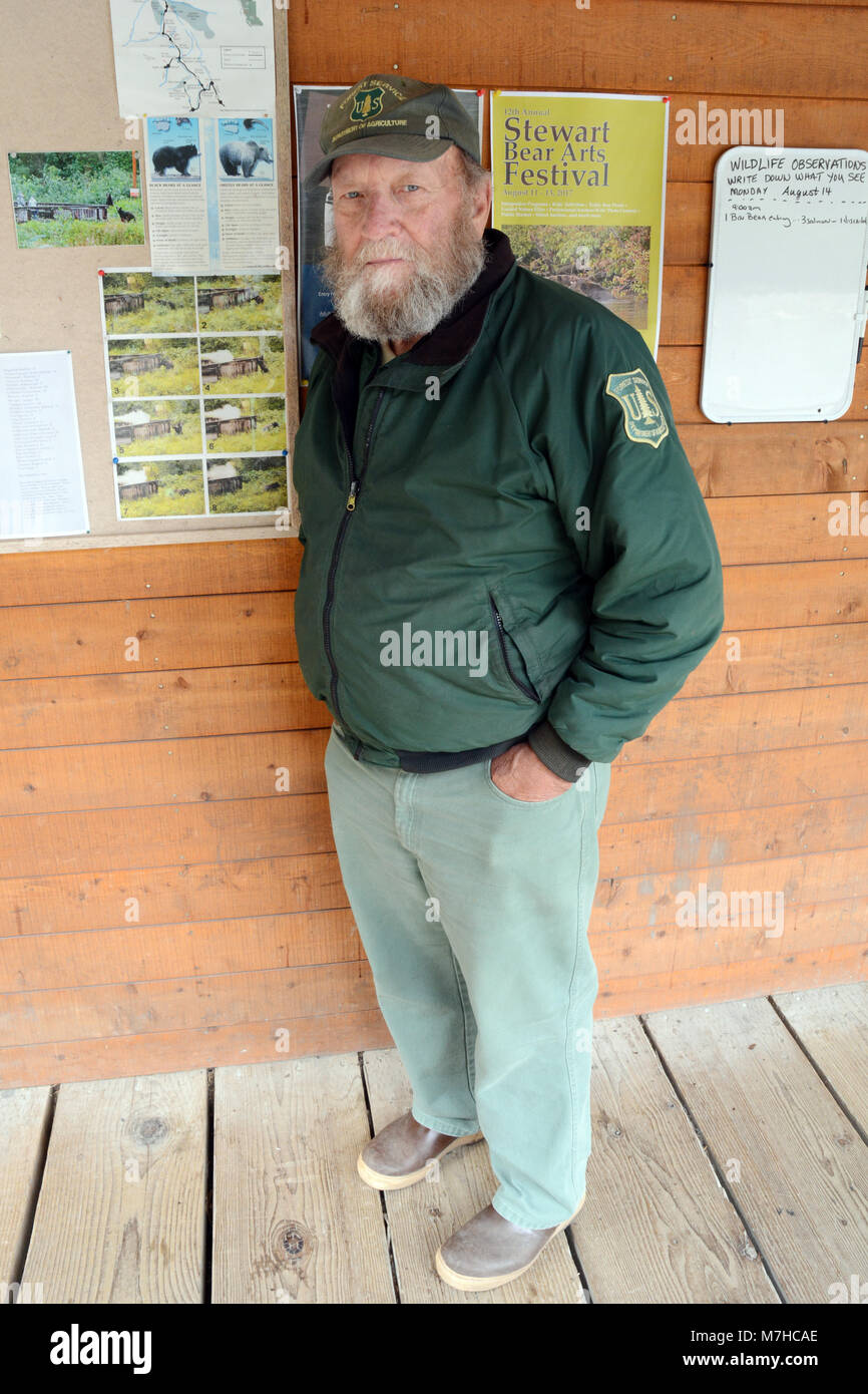 A portrait of uniformed U.S. Forest Service Officer at the Fish Creek Wildlife Observation Site, in the Tongass National Forest, near Hyder, Alaska. Stock Photo