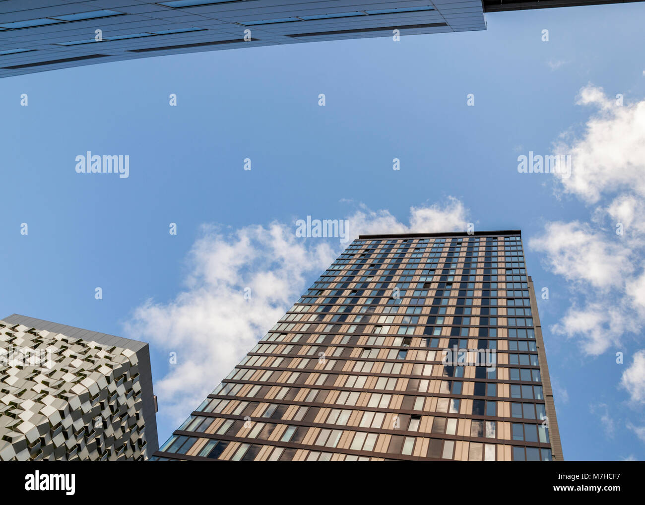 Looking up between modern tall buildings in Sheffield, England, UK Stock Photo