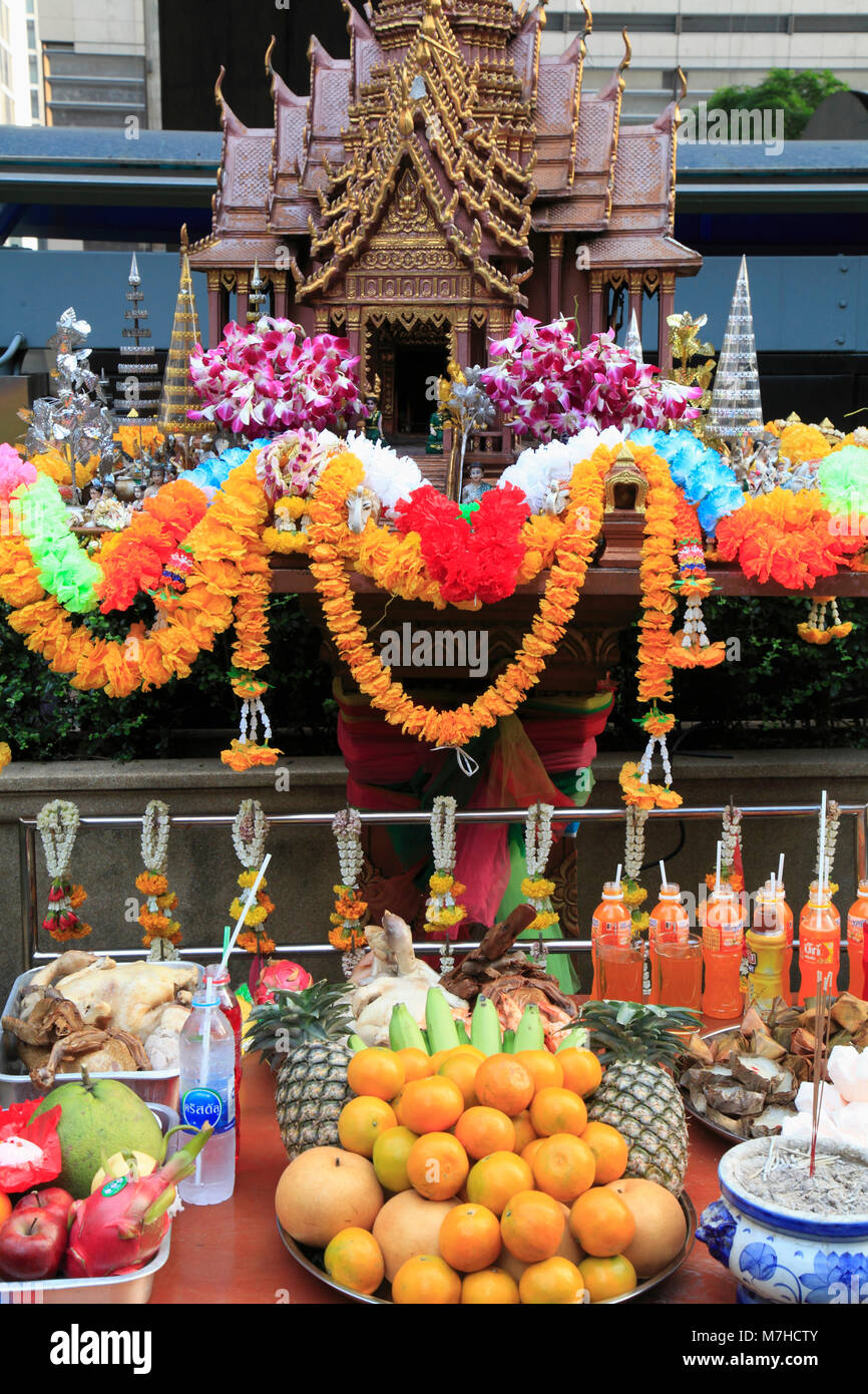 Thailand, Bangkok, Ploenchit Road, spirit house, offerings, Stock Photo