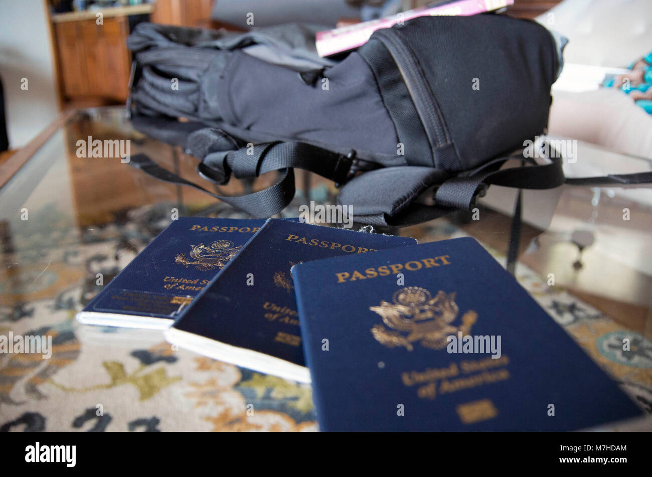 A passport is an essential tool for any international trip. Stock Photo