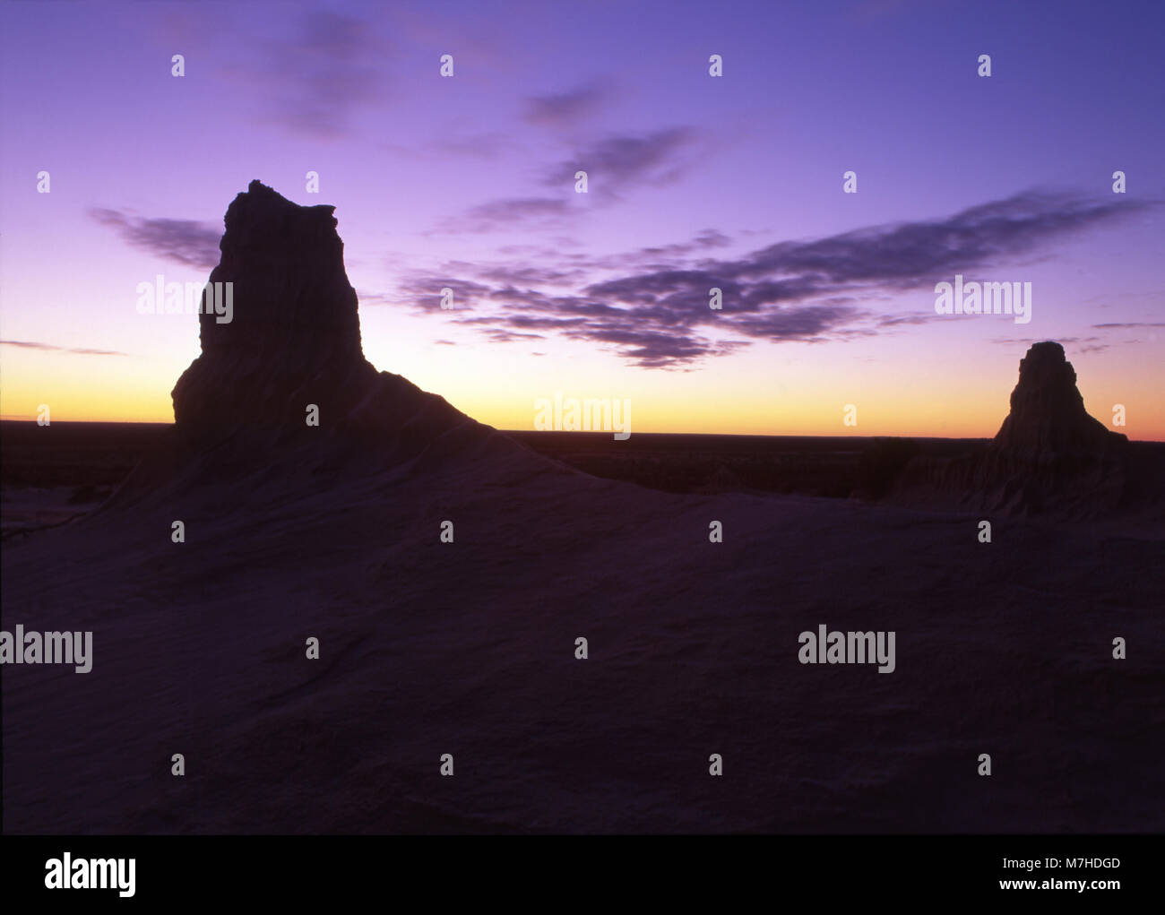 SUNSET BEHIND LUNETTES IN MUNGO NATIONAL PARK, NEW SOUTH WALES, AUSTRALIA. Stock Photo