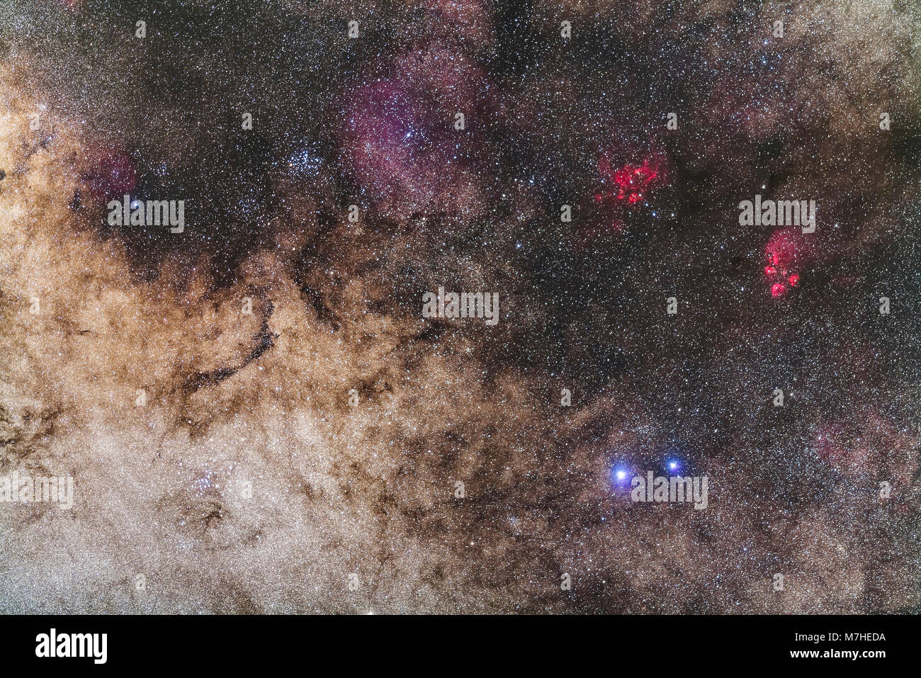 The rich region in the tail of Scorpius with star clusters, nebulae and Milky Way star clouds. Stock Photo