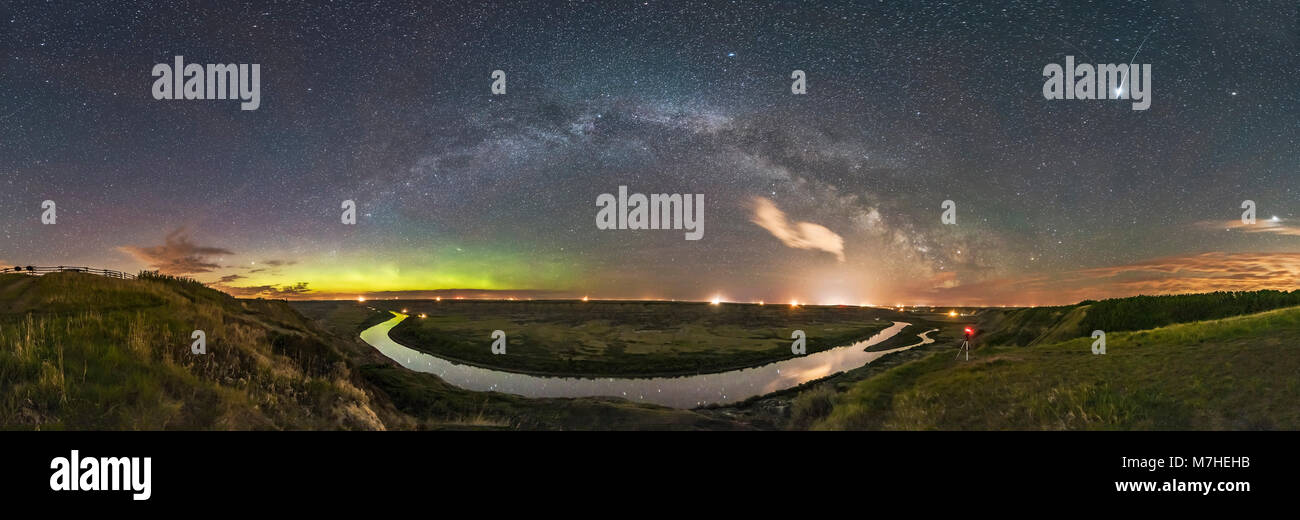 The Milky Way arching over the scenic bend of the Red Deer River, Alberta, Canada. Stock Photo