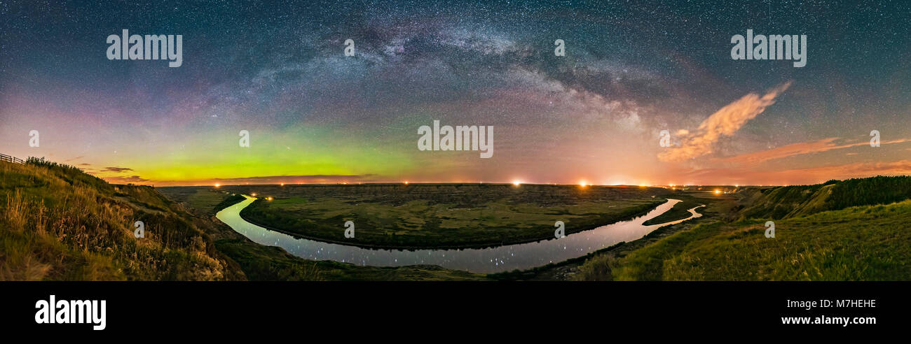 Milky WayÂ arching over the scenic bend of the Red Deer River, Alberta, Canada. Stock Photo