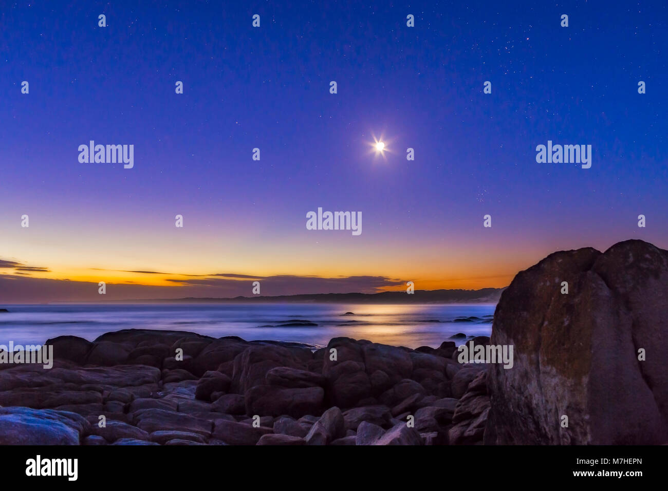 Waxing crescent moon in twilight over the Gippsland Coast of Australia Stock Photo Alamy