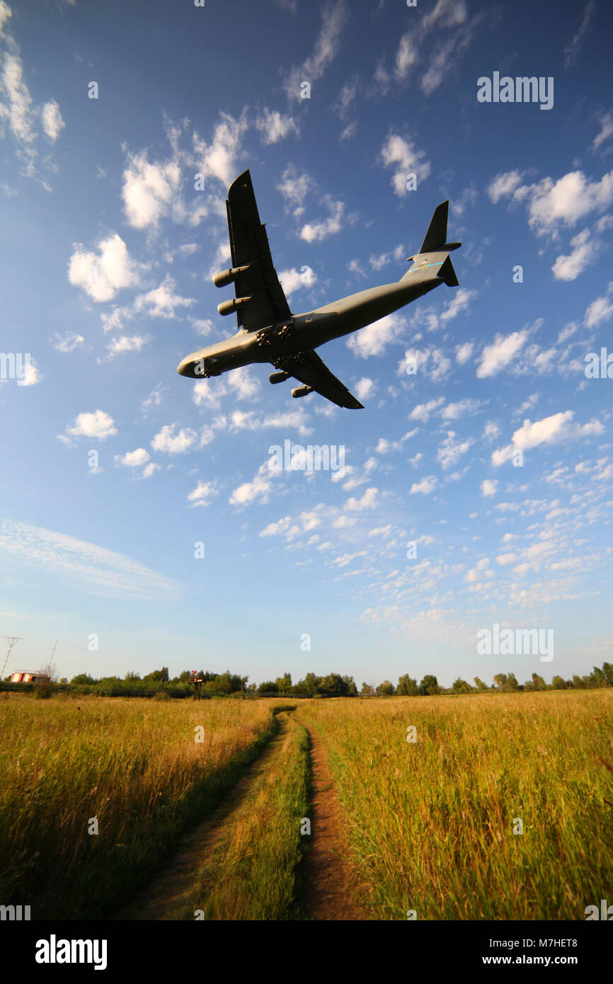 A C-5M Super Galaxy heavy transport aircraft landing, Russia. Stock Photo