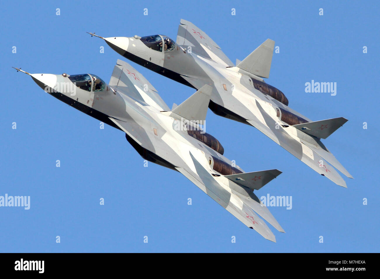 Pair of T-50 PAK-FA fifth generation Russian jet fighters. Stock Photo