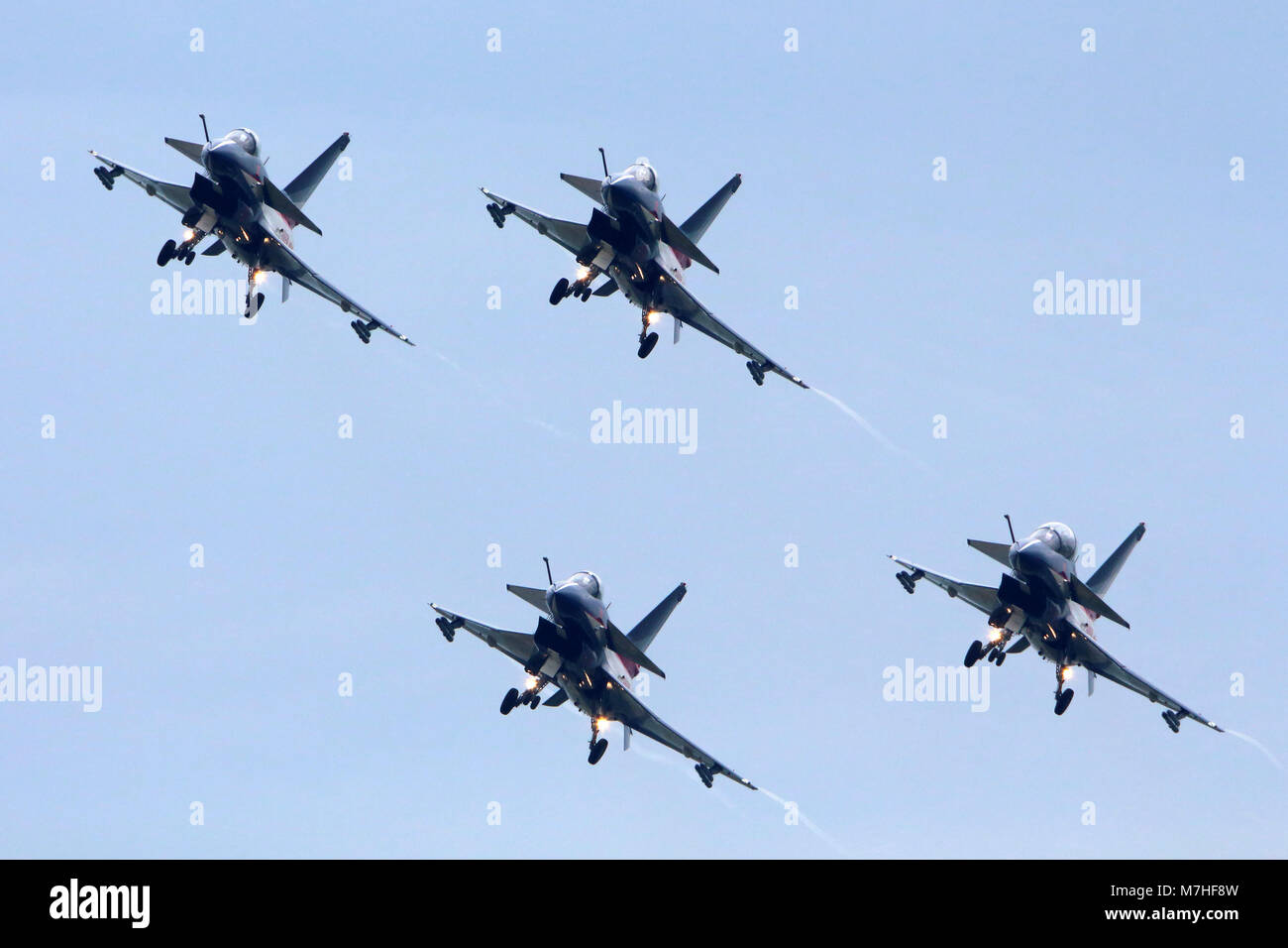 Formation of J-10 aircraft of the August 1st Chinese aerobatic team. Stock Photo