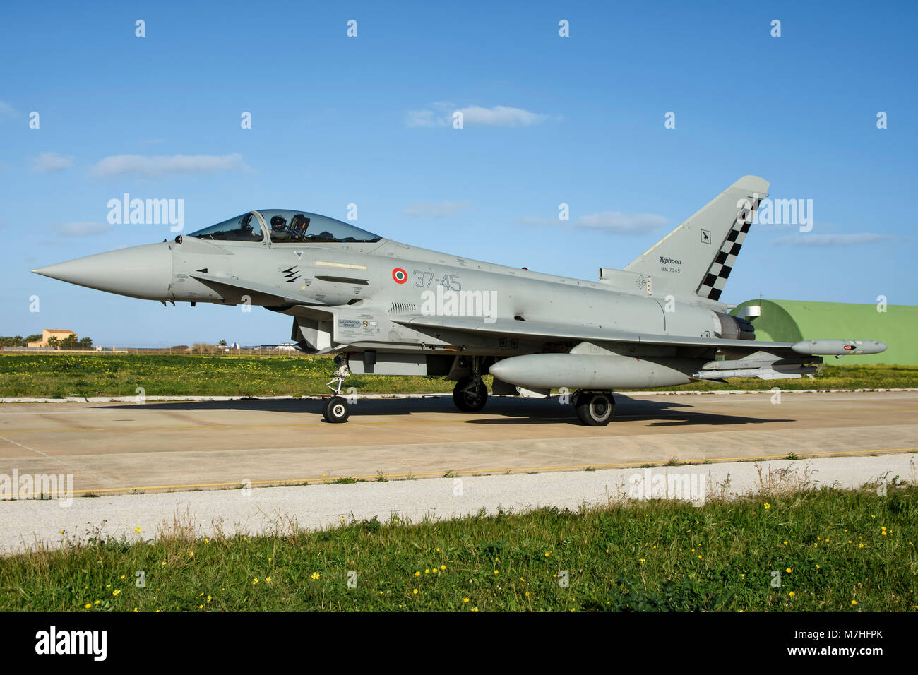 Italian Air Force F-2000A Typhoon taxiing at Trapani Air Base, Italy. Stock Photo