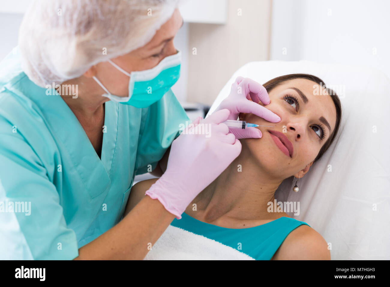 Facial correction hi-res stock photography and images - Alamy