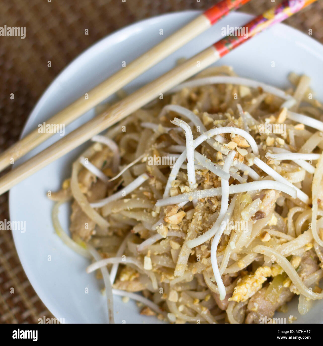 Korean rice noodles with soybean sprouts and crushed peanuts in the