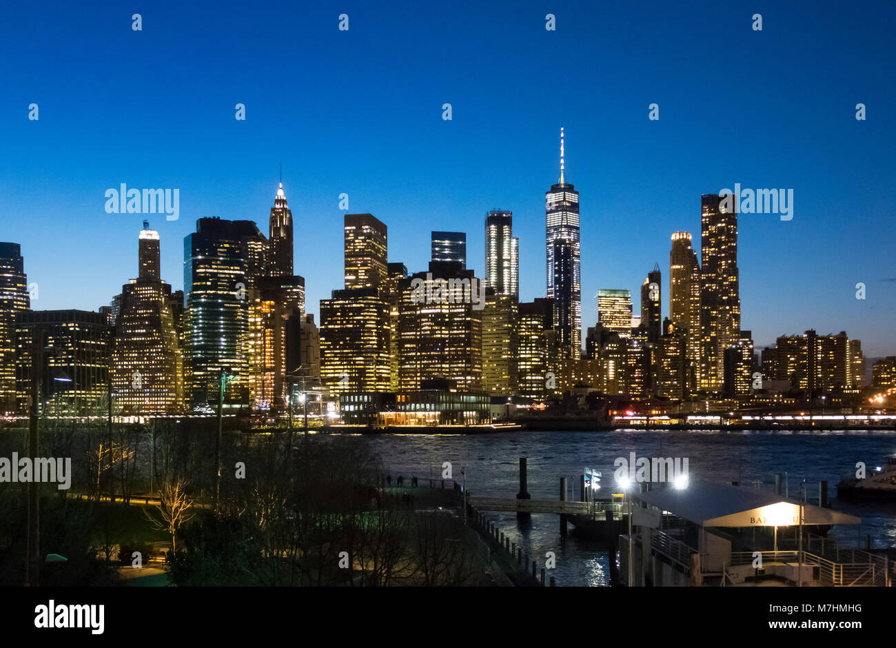 The Lower Manhattan skyline as seen from Dumbo, Brooklyn at night Stock Photo