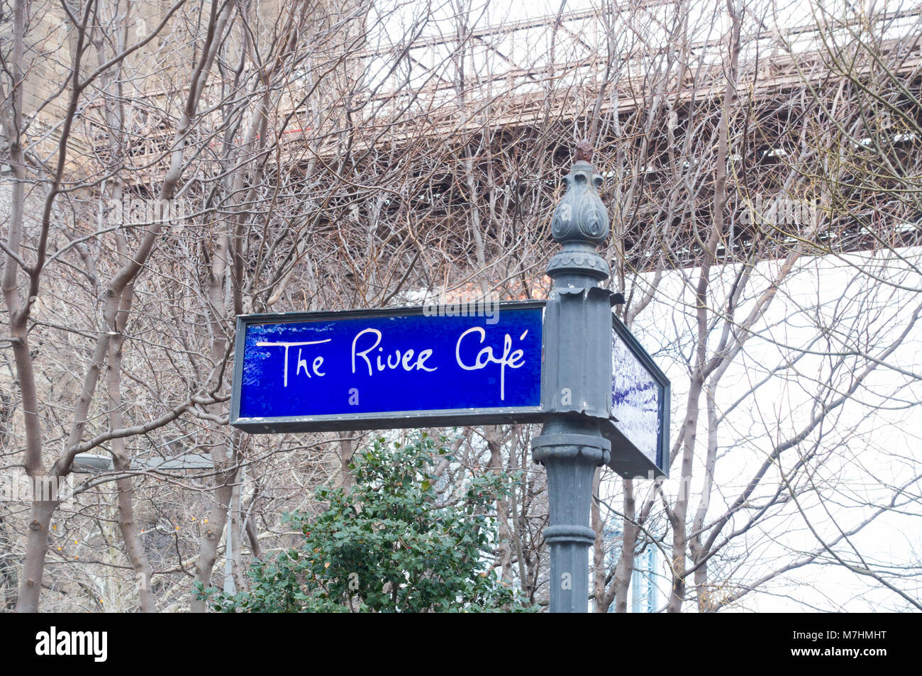 Sign outside the River Cafe in Dumbo, Brooklyn, with Brooklyn Bridge in background Stock Photo