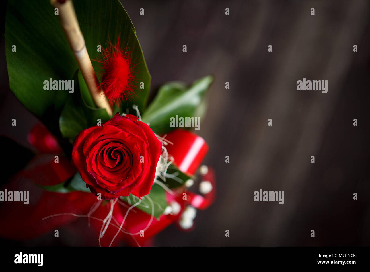 top view of romantic red rose on wood table background Stock Photo - Alamy