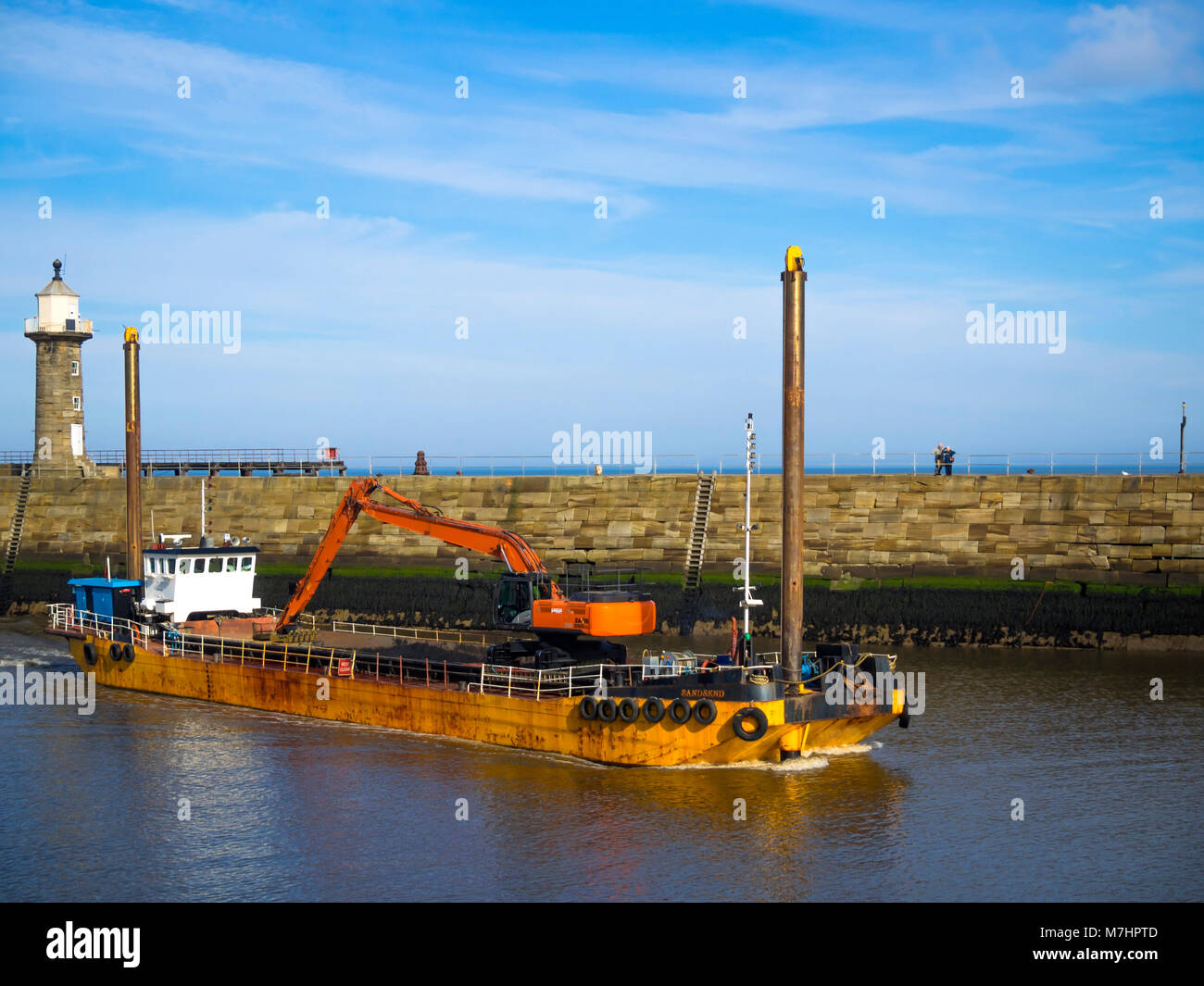 Excavation port maintenance dredger Sandsend entering Whitby harbour