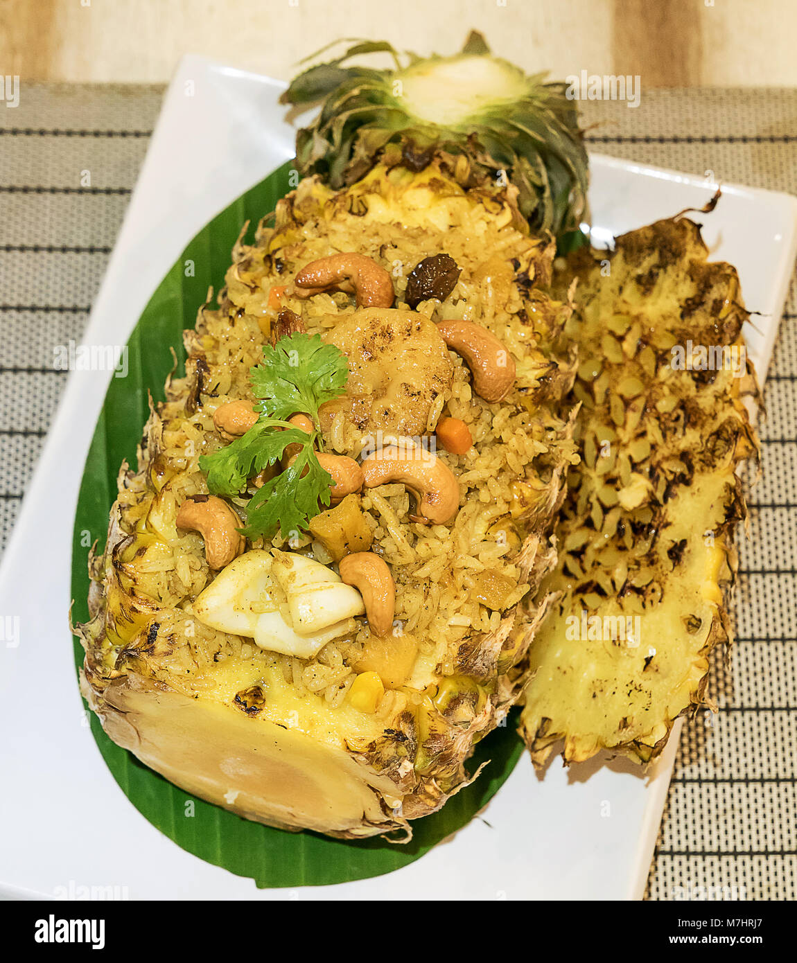 Pineapple fried rice serve in whole pineapple Stock Photo Alamy