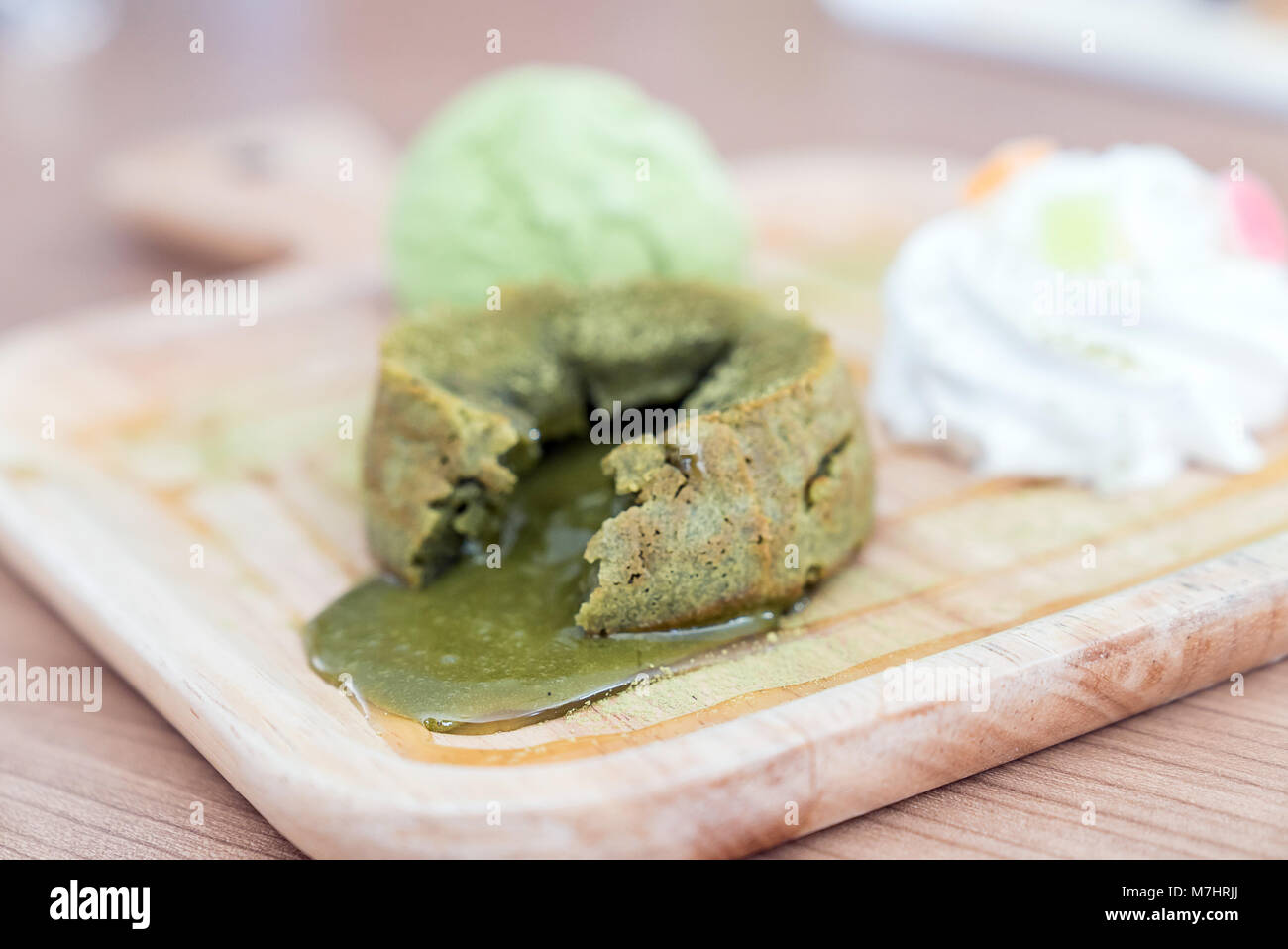 green tea lava cake with ice cream and green tea sauce Stock Photo