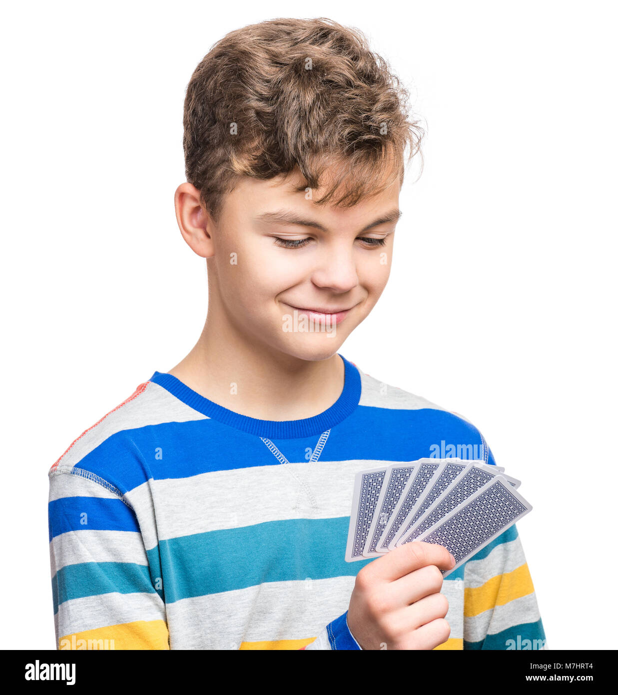 Teen boy with gamble cards Stock Photo