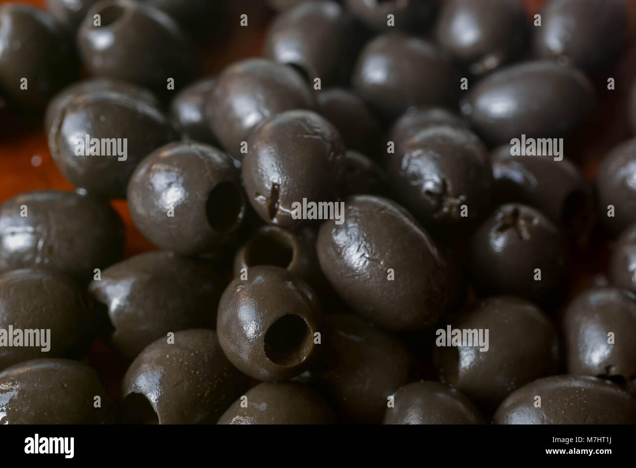 group of black olives macro Stock Photo Alamy