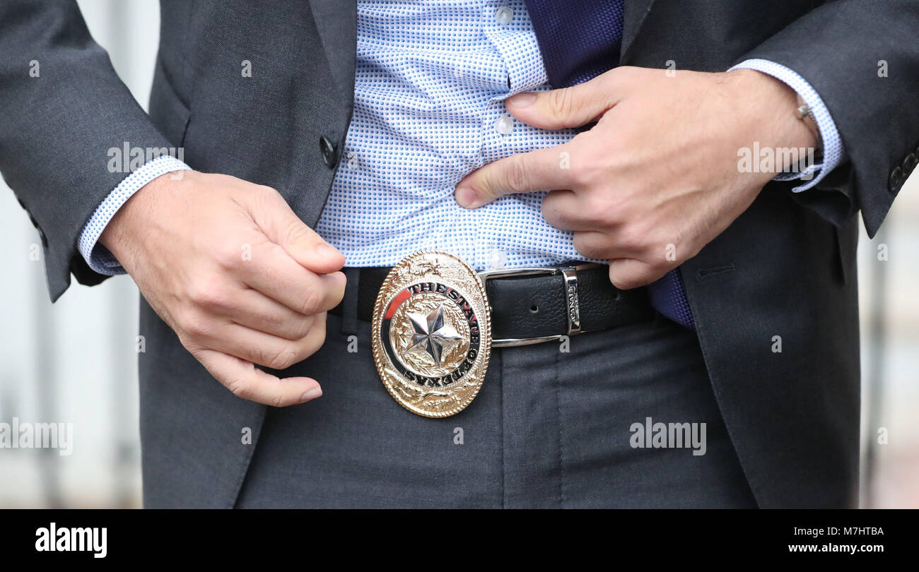 Taoiseach Leo Varadkar displays a belt buckle given to him by Texas Governor Greg Abbott at the Governors Mansion in Austin at the beginning of his week long visit to the United States of America. Stock Photo