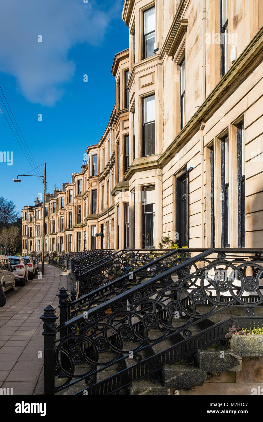 View of row of traditional sandstone tenement apartment buildings in Glasgow West End, Scotland, united kingdom Stock Photo