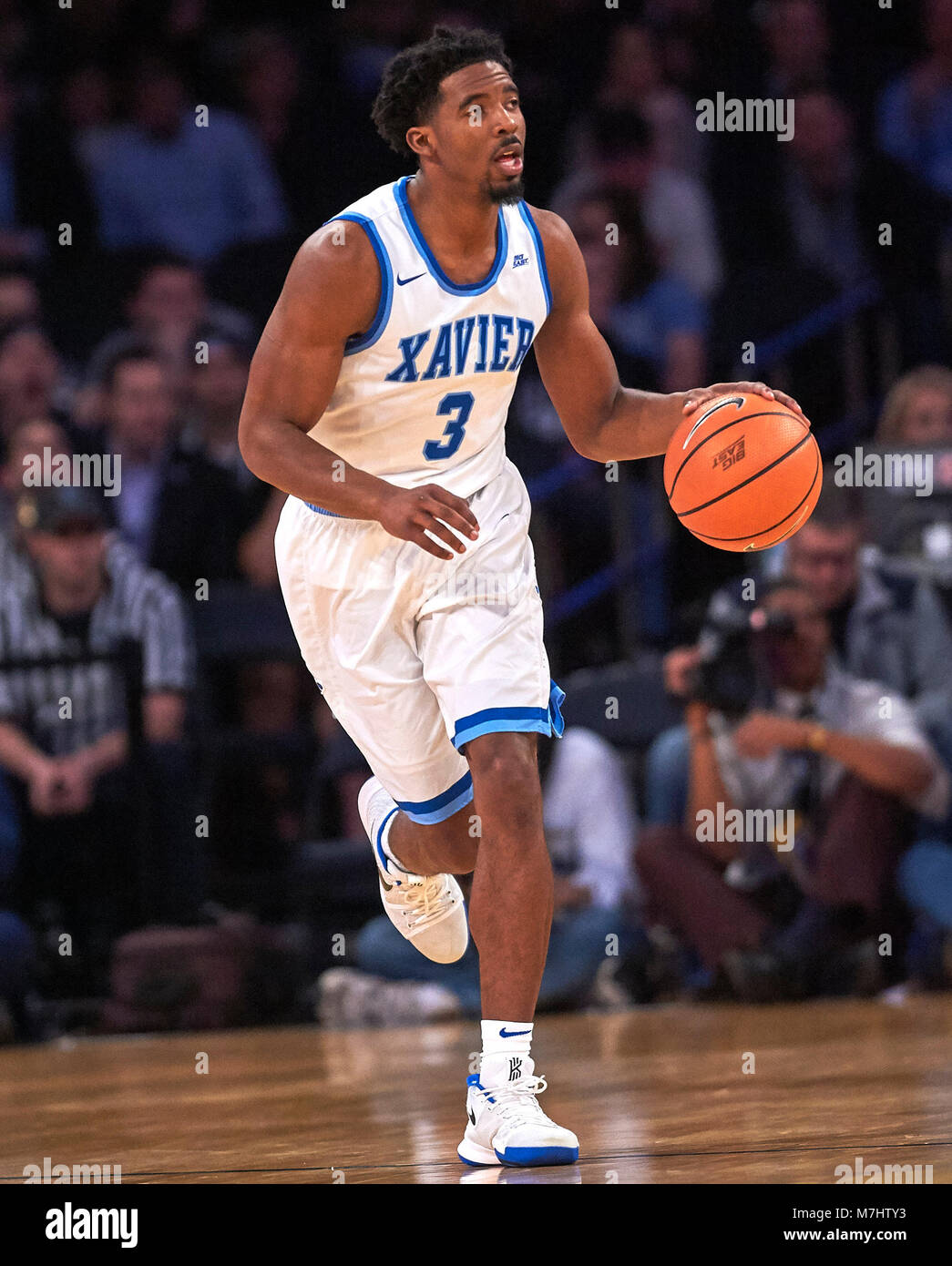 New York, New York, USA. 9th Mar, 2018. Xavier Musketeers guard Quentin Goodin (3) brings the ball up court in the first half of semifinals during the Big East Conference Tournament at Madison Square Garden in New York City. Providence defeats Xavier in overtime 75-72. Duncan Williams/CSM/Alamy Live News Stock Photo