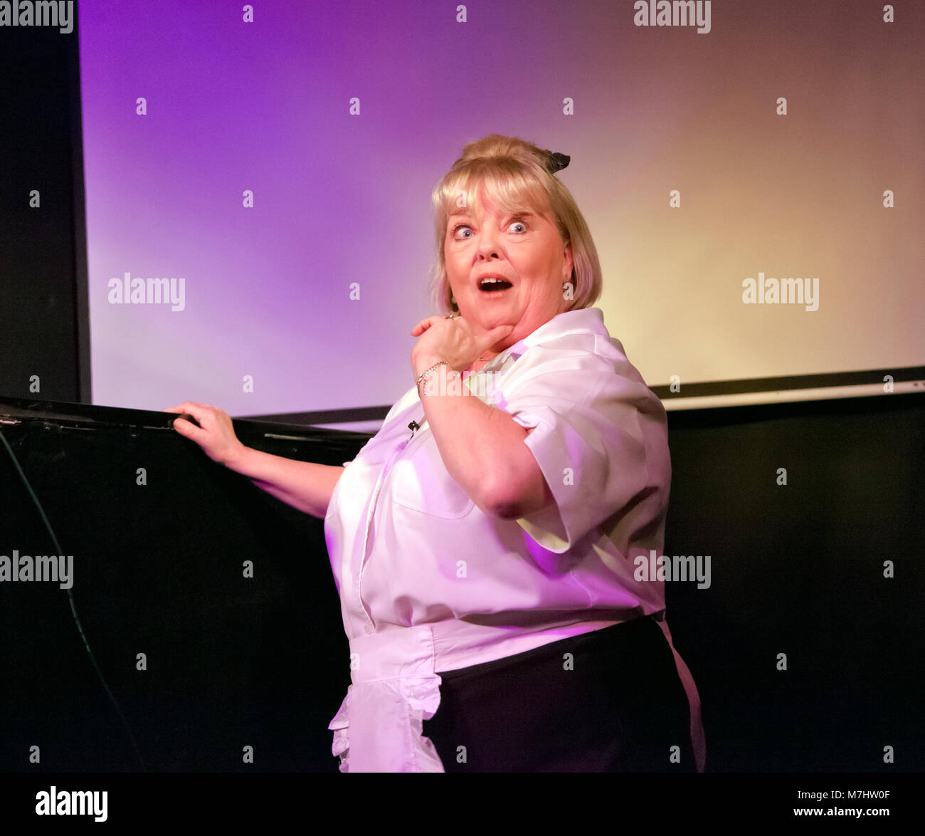 Sue Hodge reprises her role as Mimi Lebonq,  from the hit TV series and stage show  Allo `Allo, in a one woman show at the Phoenix Artist Club Stock Photo