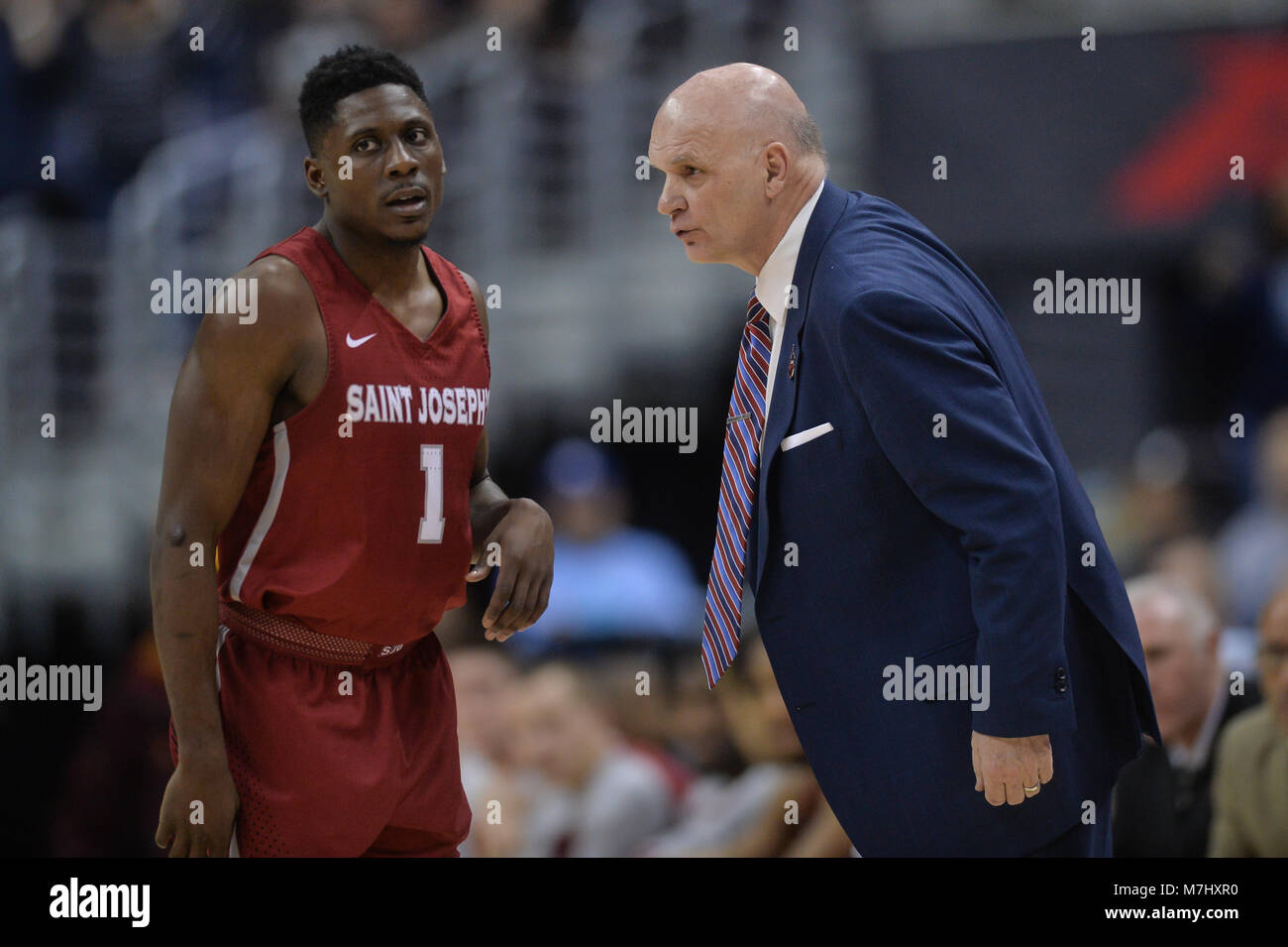 Washington, DC, USA. 10th Mar, 2018. Saint Joseph's Head Coach PHIL MARTELLI talks with SHAVAR NEWKIRK (1) during the semi-final game held at Capital One Arena in Washington, DC. Credit: Amy Sanderson/ZUMA Wire/Alamy Live News Stock Photo