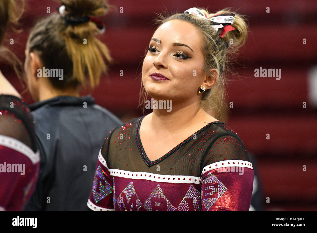 March 9, 2017 - Philadelphia, Pennsylvania, U.S - Temple Owls gymnast KERRA MASELLA watches teammates prep for the balance beam during a meet held in Philadelphia, PA. Temple finished second to Maryland in the tri-meet. (Credit Image: © Ken Inness via ZUMA Wire) Stock Photo